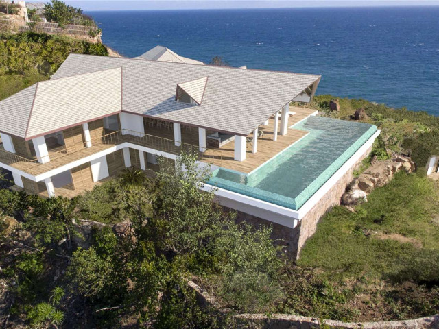 Unrivaled 5 Bedroom Balinese Inspired Hillside Estate with Magnificent Panoramic Views for Sale in Windward Bay, Antigua