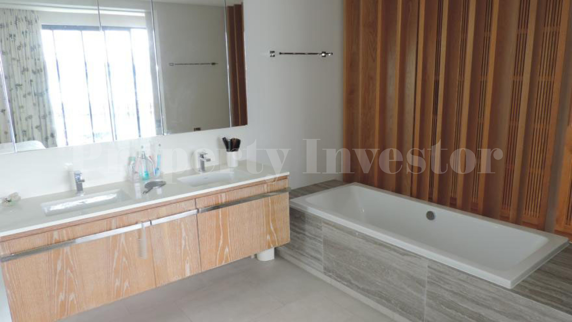 Exclusive 3 Bedroom Luxury Designer Beachfront Apartment with Spectacular Sea Views for Sale in Mahé, Seychelles