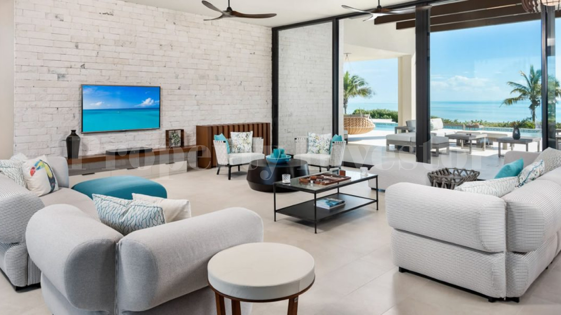 Изысканный роскошный дом на 7 спален на пляже в Тёркс и Кайкос