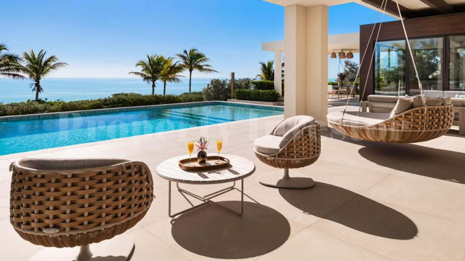 Изысканный роскошный дом на 7 спален на пляже в Тёркс и Кайкос