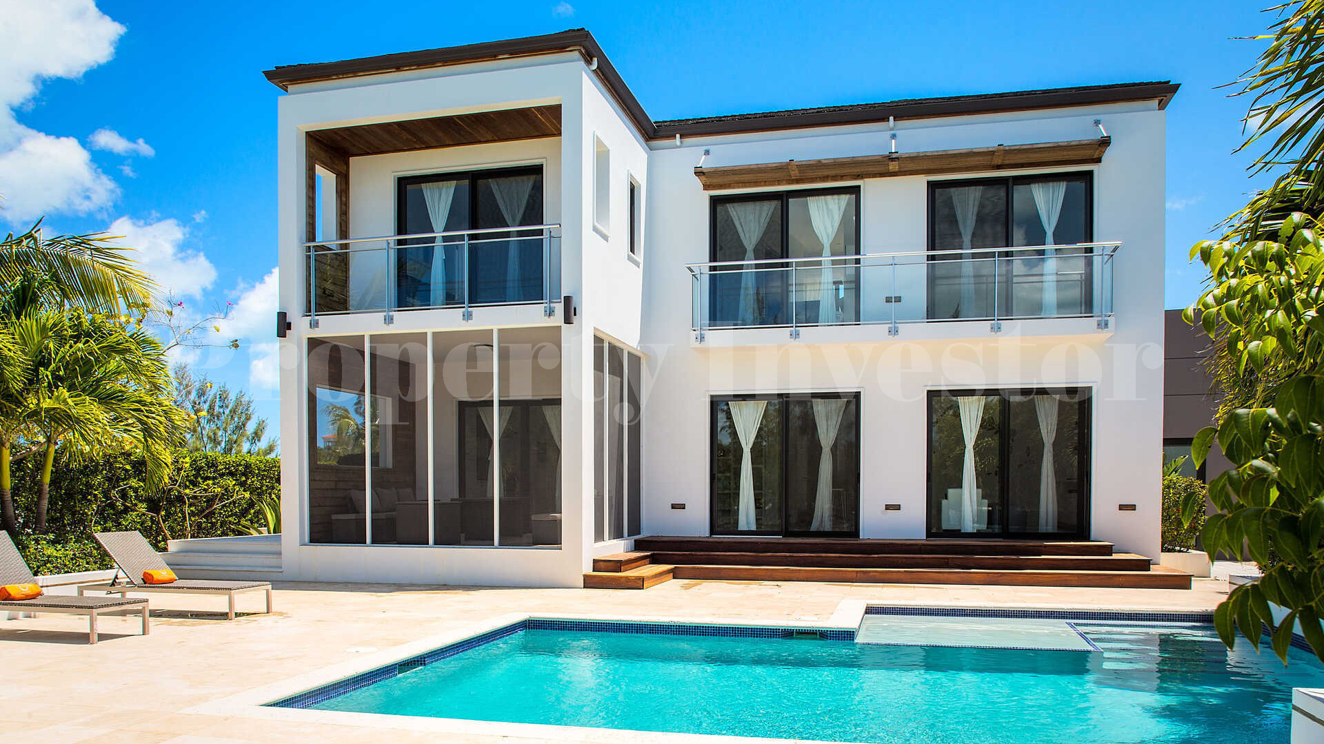 Роскошная вилла с 3 спальнями на берегу канала в Ливарде, Тёркс и Кайкос