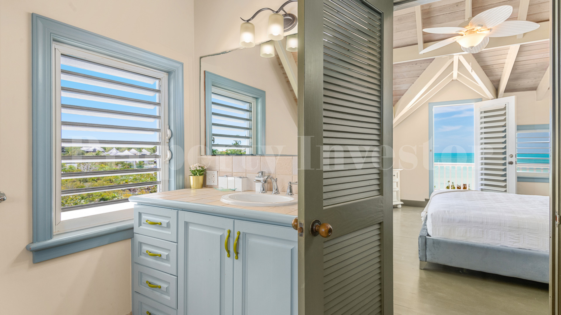 Fantastic 4 Bedroom Cape Cod Style Luxury Beach House for Sale  on Taylor Bay Beach, Turks & Caicos