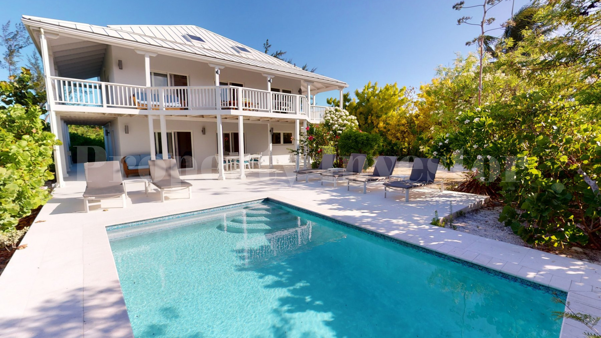 Beautiful 6 Bedroom Caribbean Style Luxury Beachfront Villa with Private Beach Access for Sale in Grace Bay, Turks & Caicos