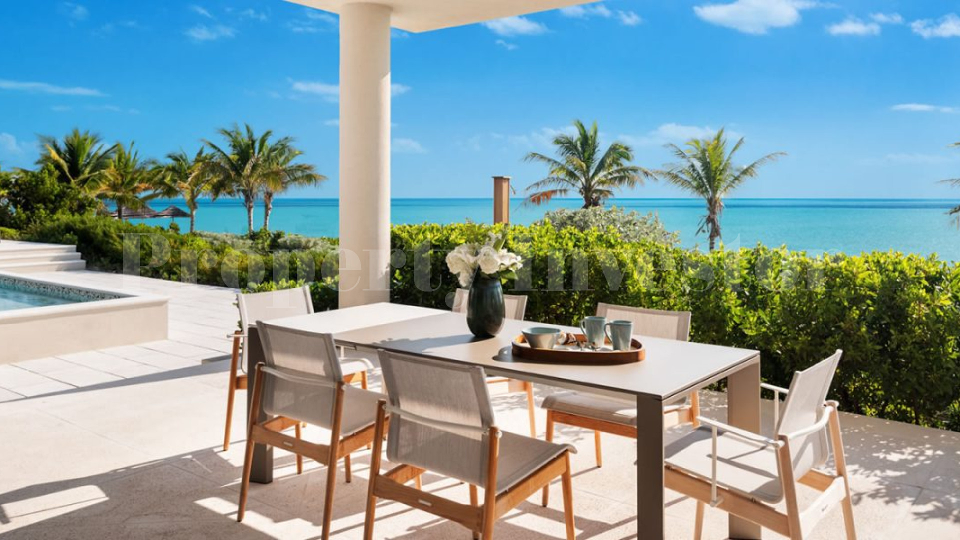 Изысканный роскошный дом на 7 спален на пляже в Тёркс и Кайкос