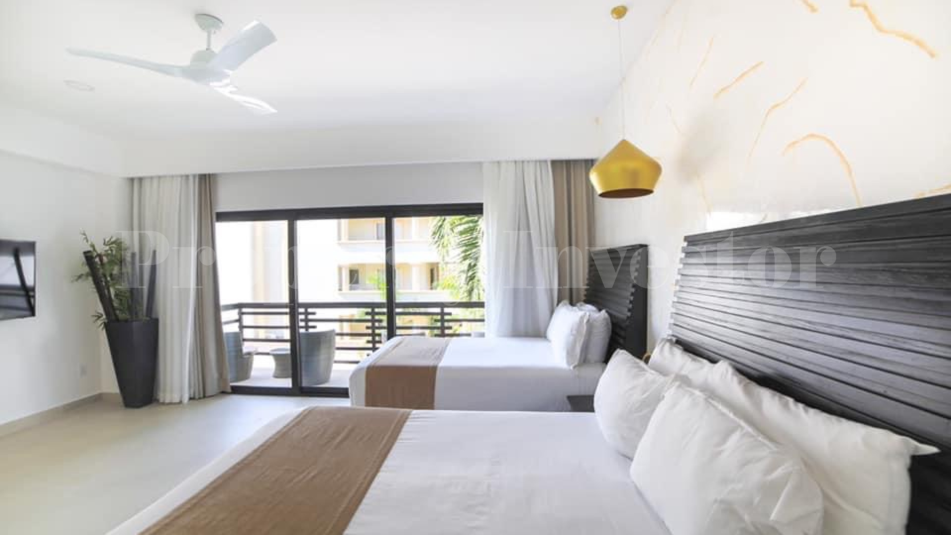 Продается портфолио из 10 апартаментов от 265,000$ в жилом бутик-комплексе на первой линии в Плайя Дель Кармен