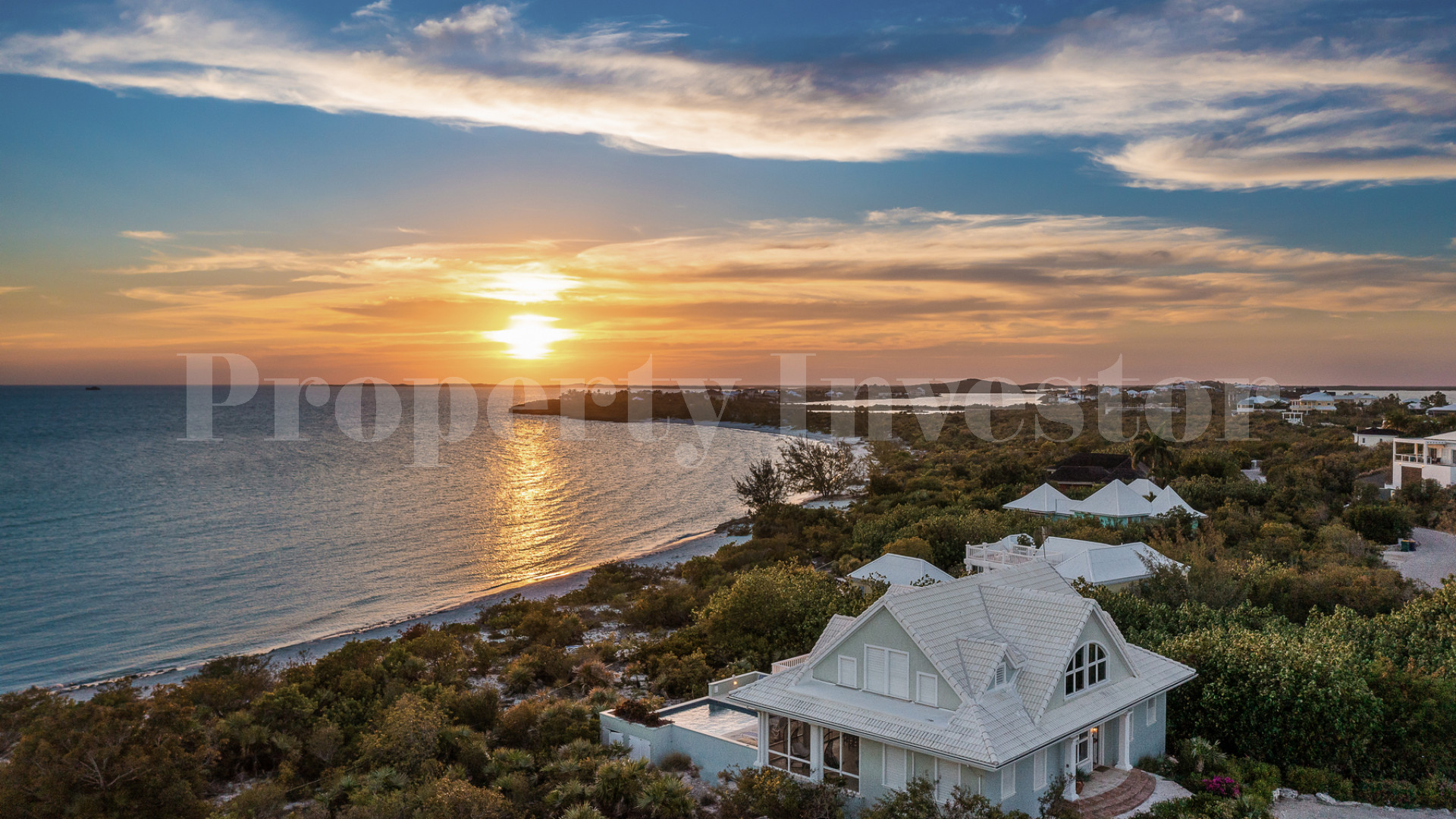 Fantastic 4 Bedroom Cape Cod Style Luxury Beach House for Sale  on Taylor Bay Beach, Turks & Caicos