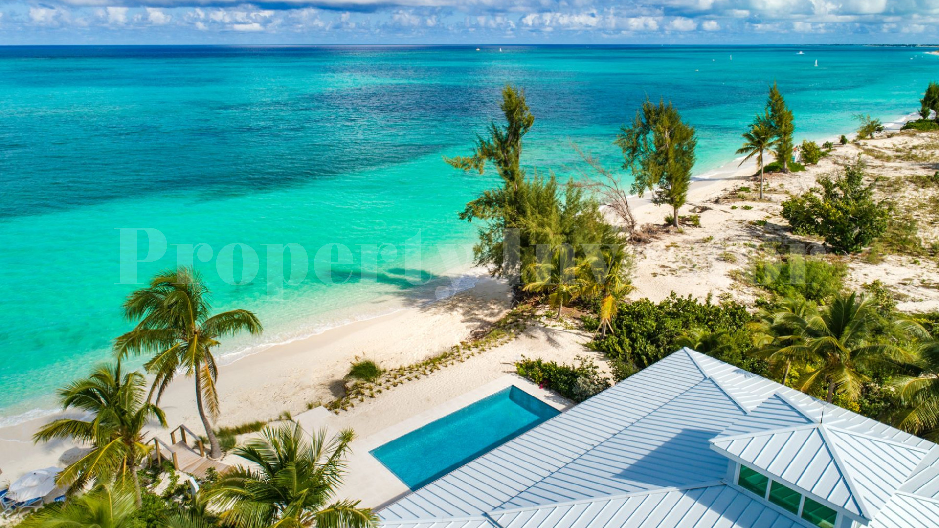 Beautiful 6 Bedroom Caribbean Style Luxury Beachfront Villa with Private Beach Access for Sale in Grace Bay, Turks & Caicos