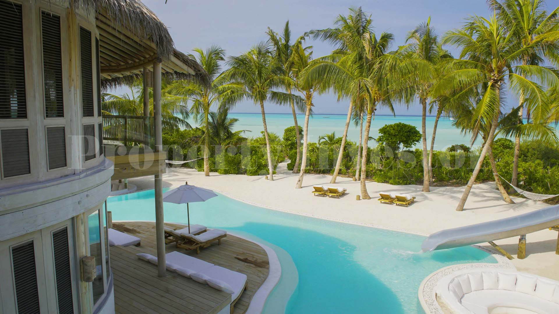 Exclusive 4 Bedroom Private Island Eco Resort Beach Residence with Slide for Sale in the Maldives