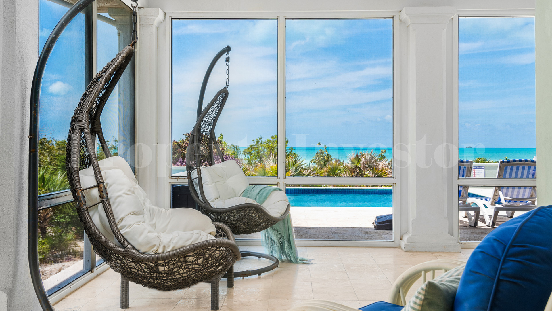 Fantastic 4 Bedroom Cape Cod Style Luxury Beach House for Sale  on Taylor Bay Beach, Turks & Caicos
