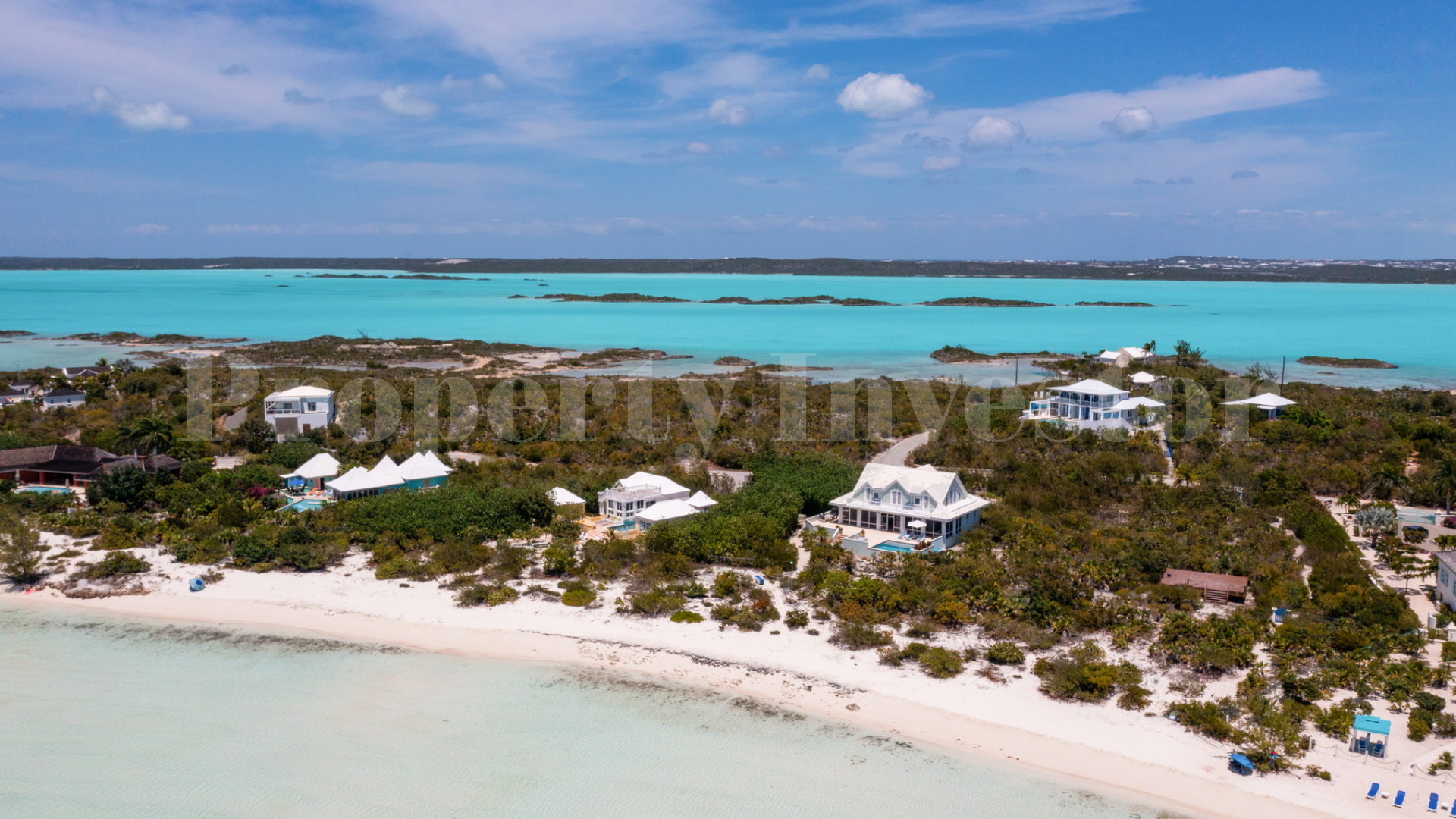 Fantastic 4 Bedroom Cape Cod Style Luxury Beach House for Sale  on Taylor Bay Beach, Turks & Caicos