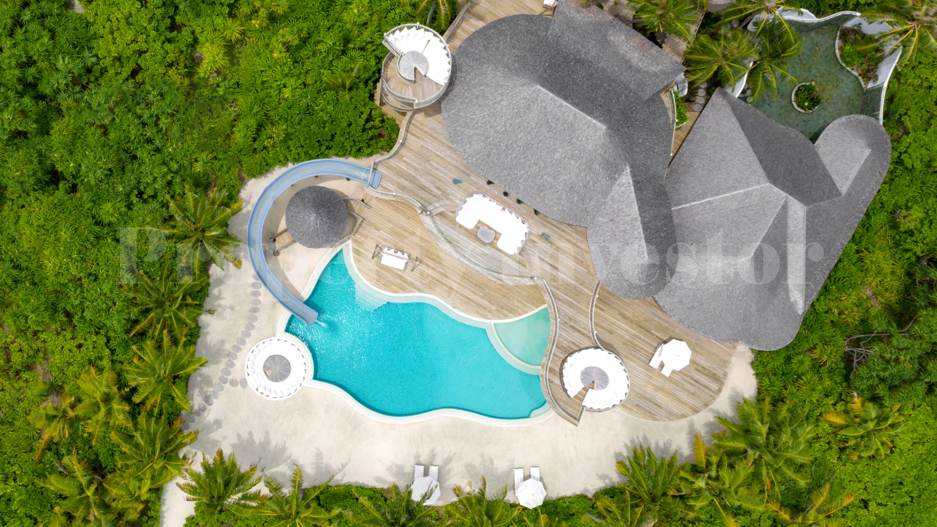 Exclusive 3 Bedroom Private Island Beach Residence with Slide for Sale in the Maldives