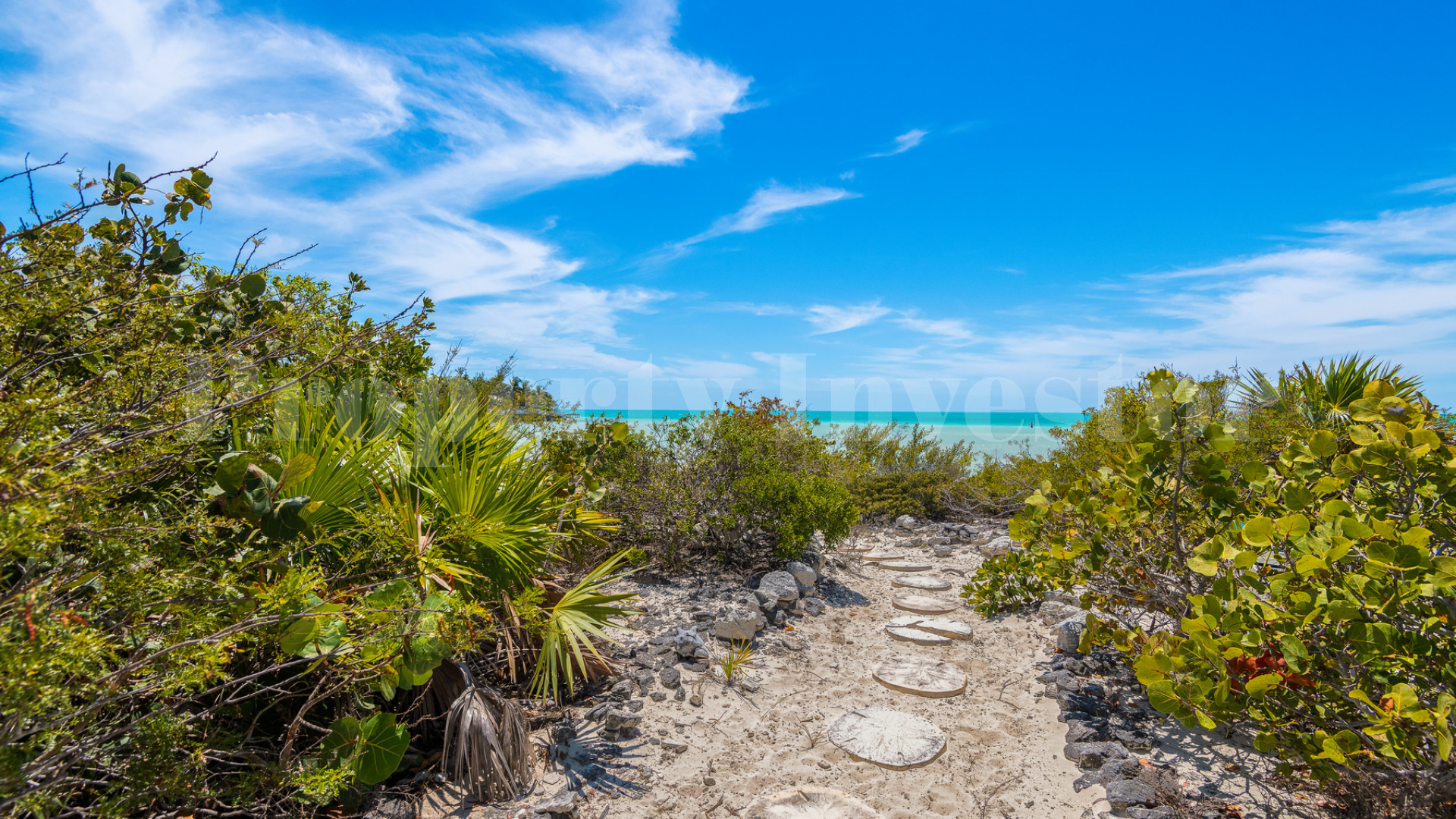 Fantastic 4 Bedroom Cape Cod Style Luxury Beach House for Sale  on Taylor Bay Beach, Turks & Caicos