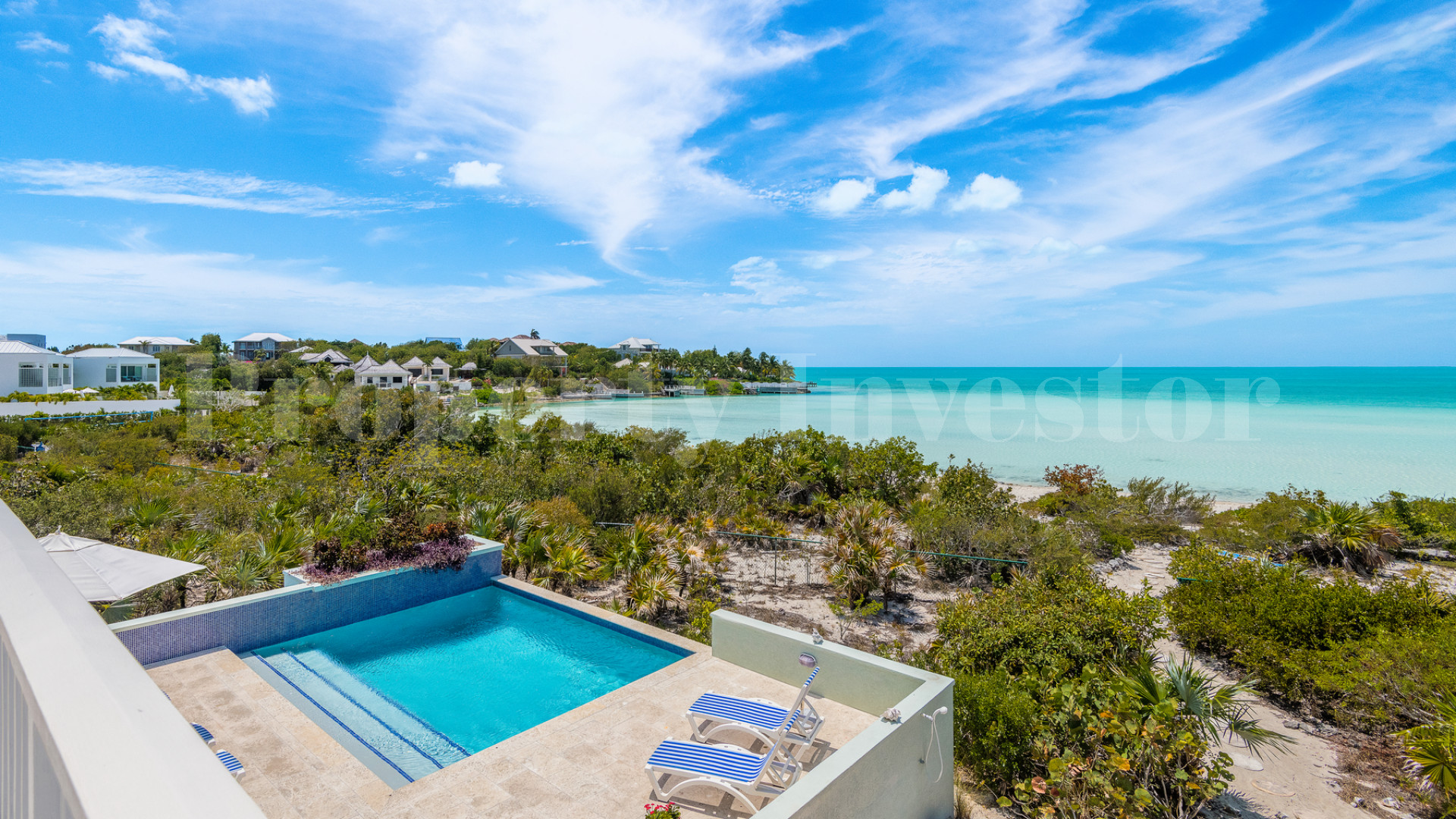 Fantastic 4 Bedroom Cape Cod Style Luxury Beach House for Sale  on Taylor Bay Beach, Turks & Caicos