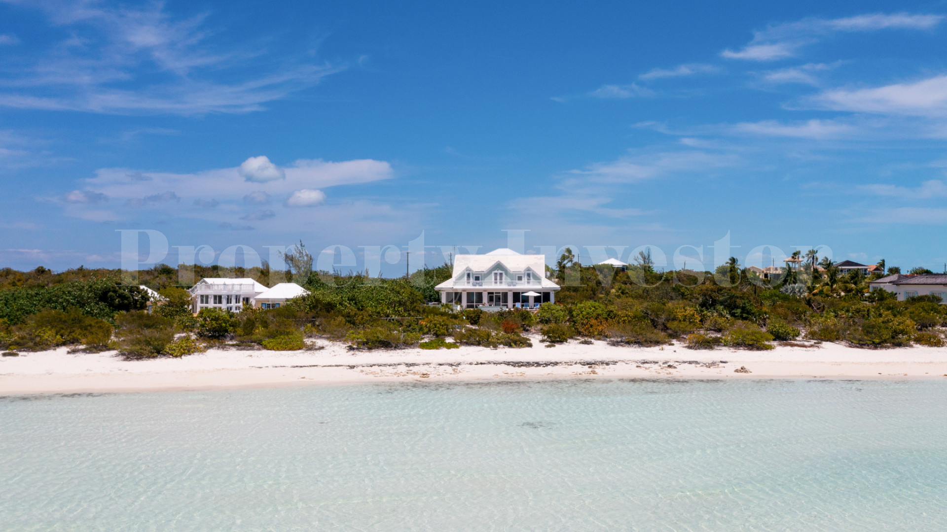 Fantastic 4 Bedroom Cape Cod Style Luxury Beach House for Sale  on Taylor Bay Beach, Turks & Caicos
