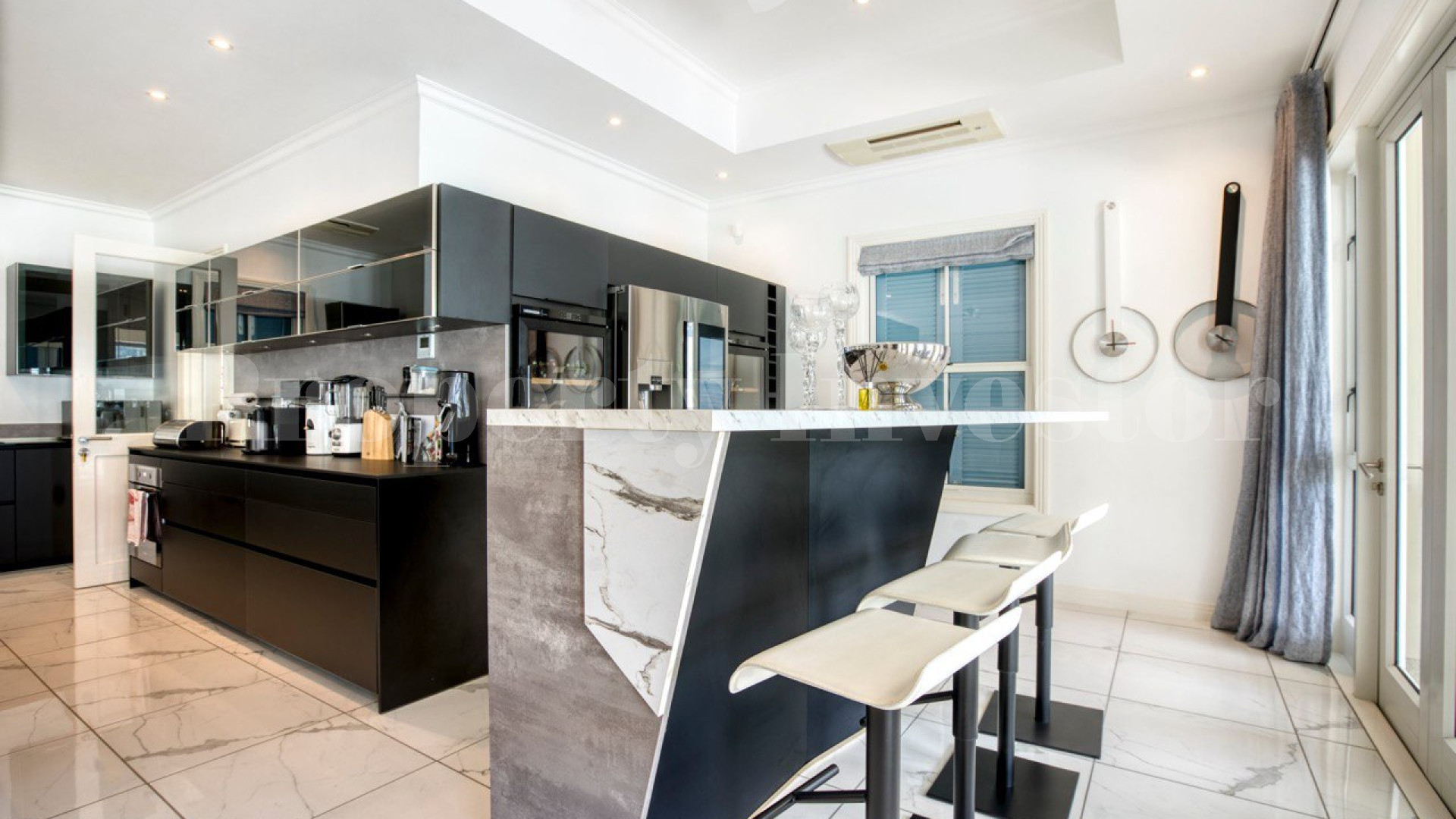 Custom Furnished 5 Bedroom Luxury Canal Front Villa with Private Cinema for Sale on Eden Island, Seychelles