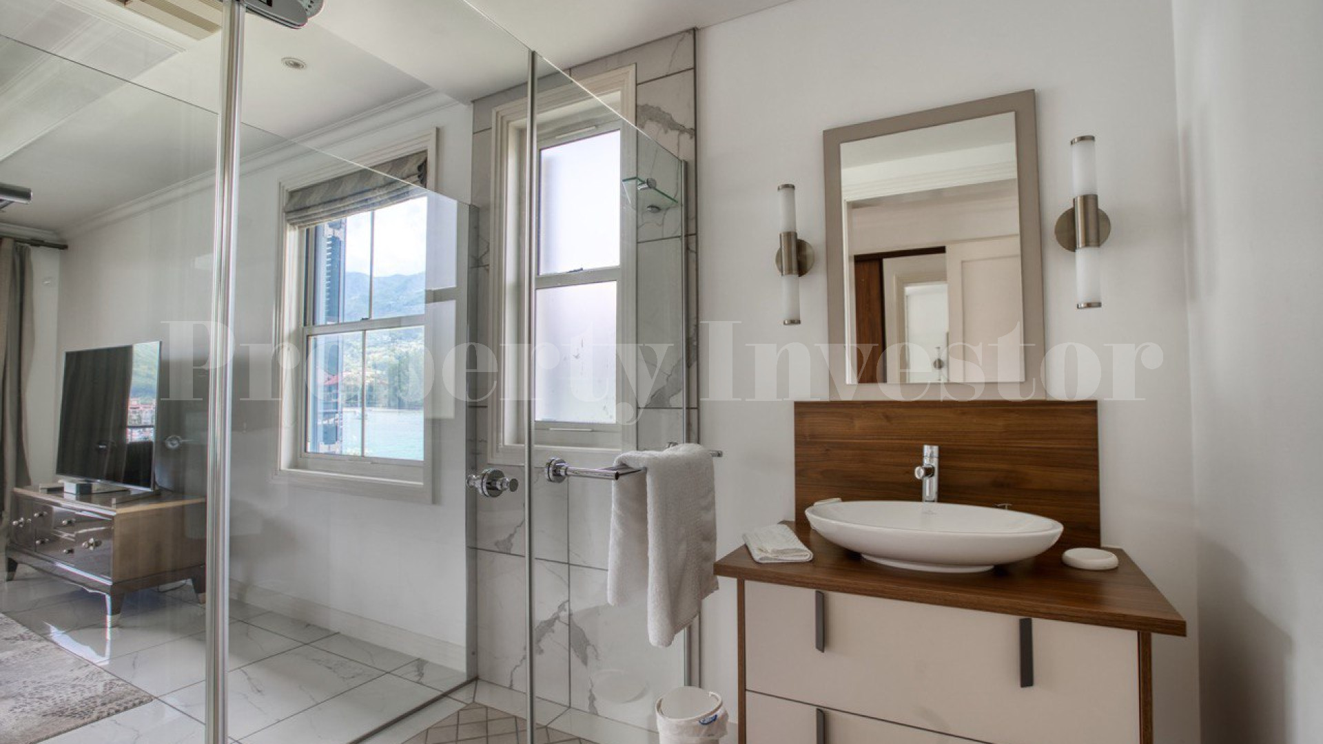 Custom Furnished 5 Bedroom Luxury Canal Front Villa with Private Cinema for Sale on Eden Island, Seychelles