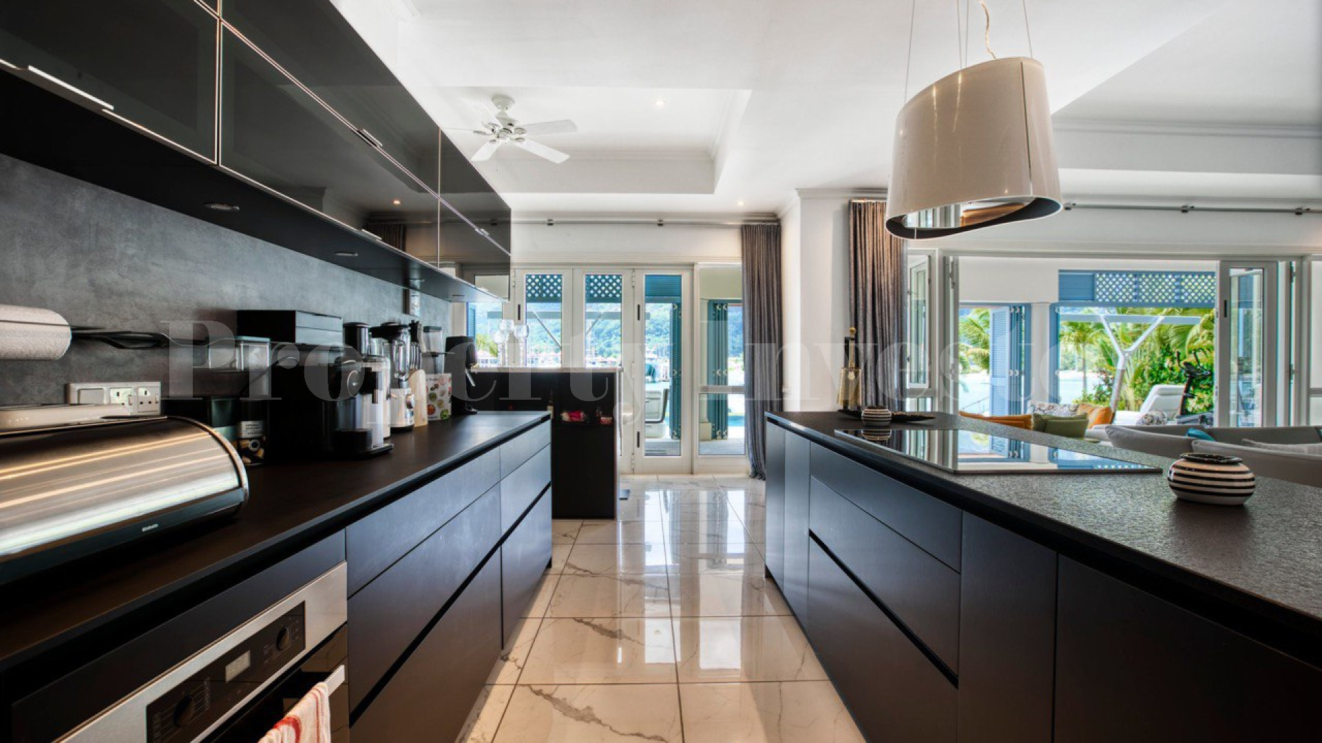 Custom Furnished 5 Bedroom Luxury Canal Front Villa with Private Cinema for Sale on Eden Island, Seychelles