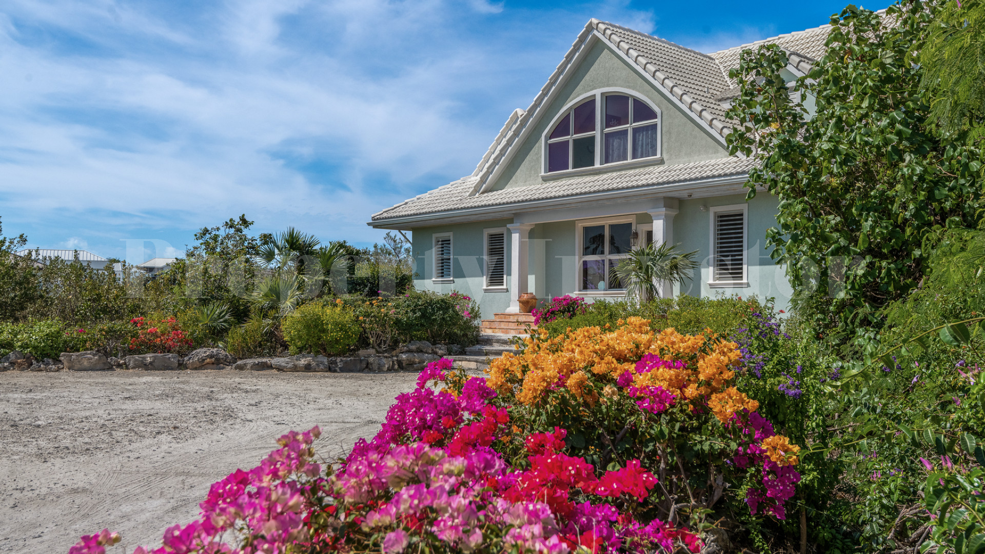 Fantastic 4 Bedroom Cape Cod Style Luxury Beach House for Sale  on Taylor Bay Beach, Turks & Caicos