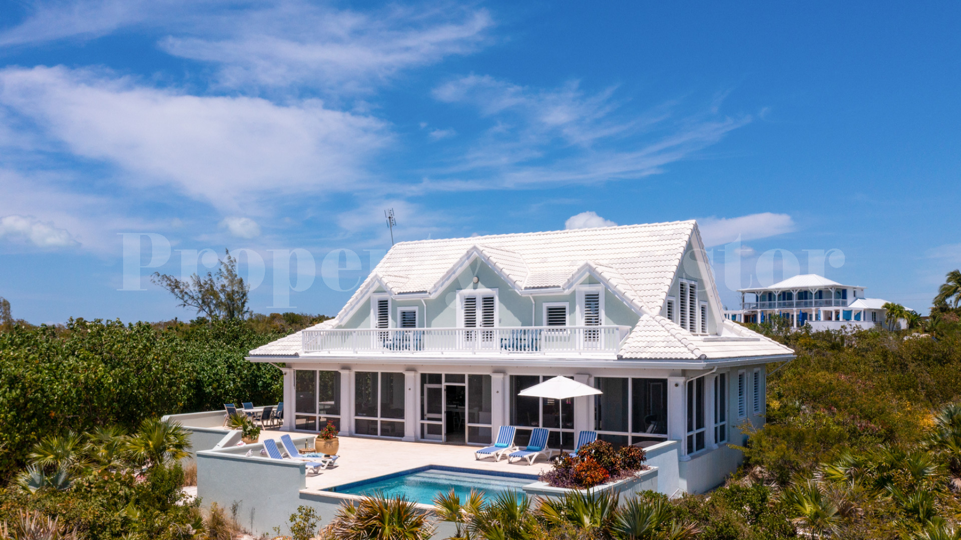 Fantastic 4 Bedroom Cape Cod Style Luxury Beach House for Sale  on Taylor Bay Beach, Turks & Caicos