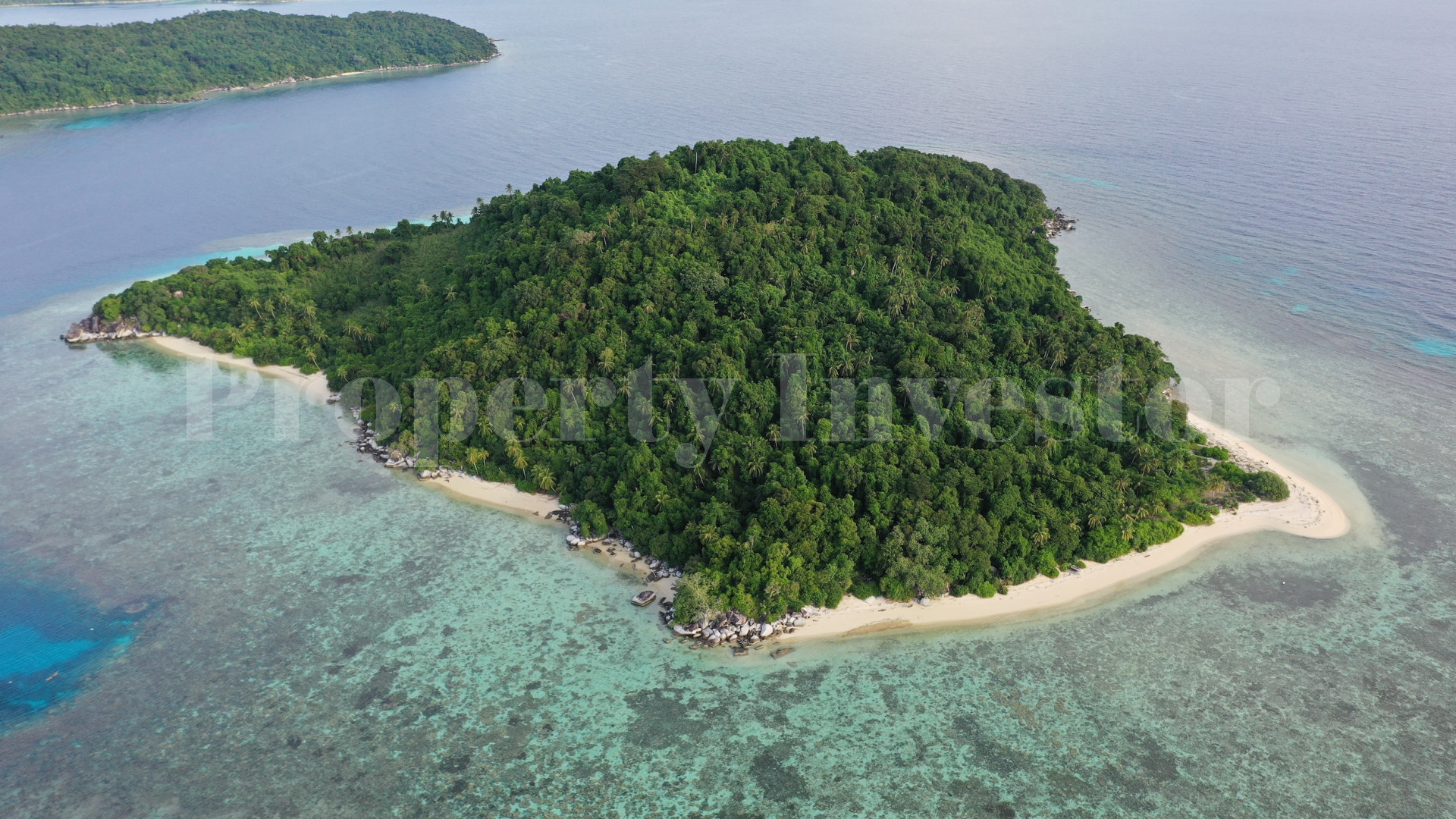 Потрясающий нетронутый остров 27 гектаров под коммерческое развитие на островах Риау, Индонезия