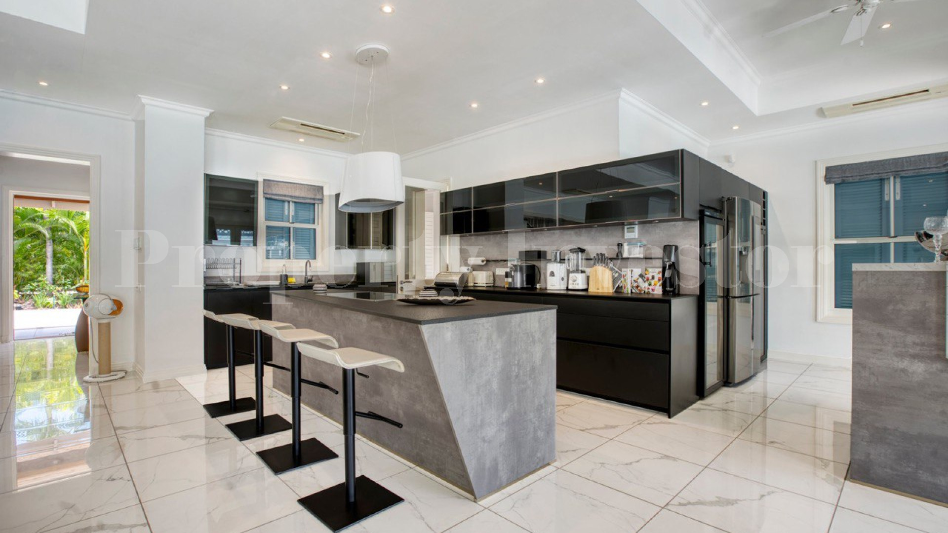 Custom Furnished 5 Bedroom Luxury Canal Front Villa with Private Cinema for Sale on Eden Island, Seychelles