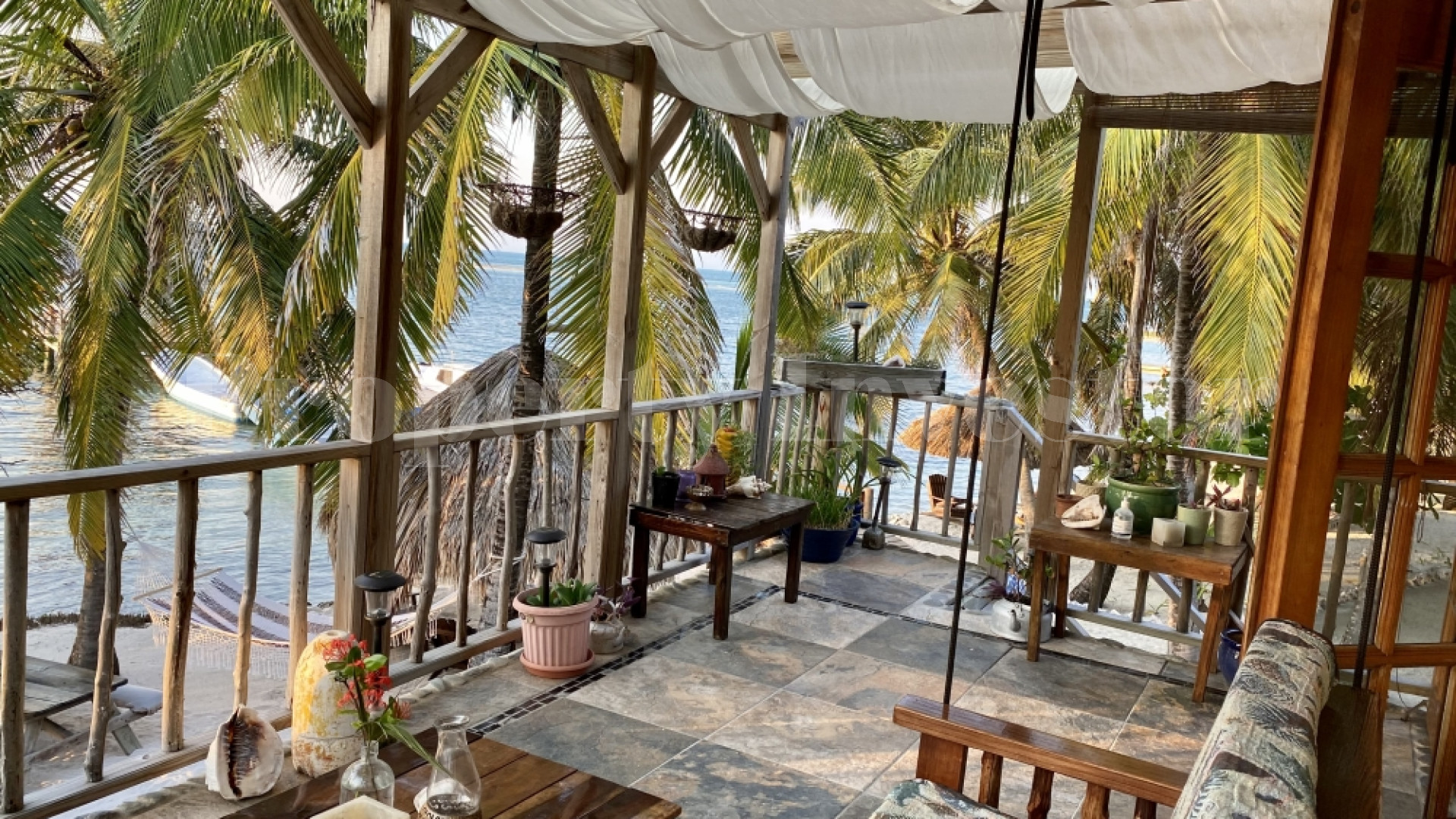 Private Island Resort & PADI 5-Star Gold Palm Dive Center for Sale on Glover's Reef Atoll, Belize