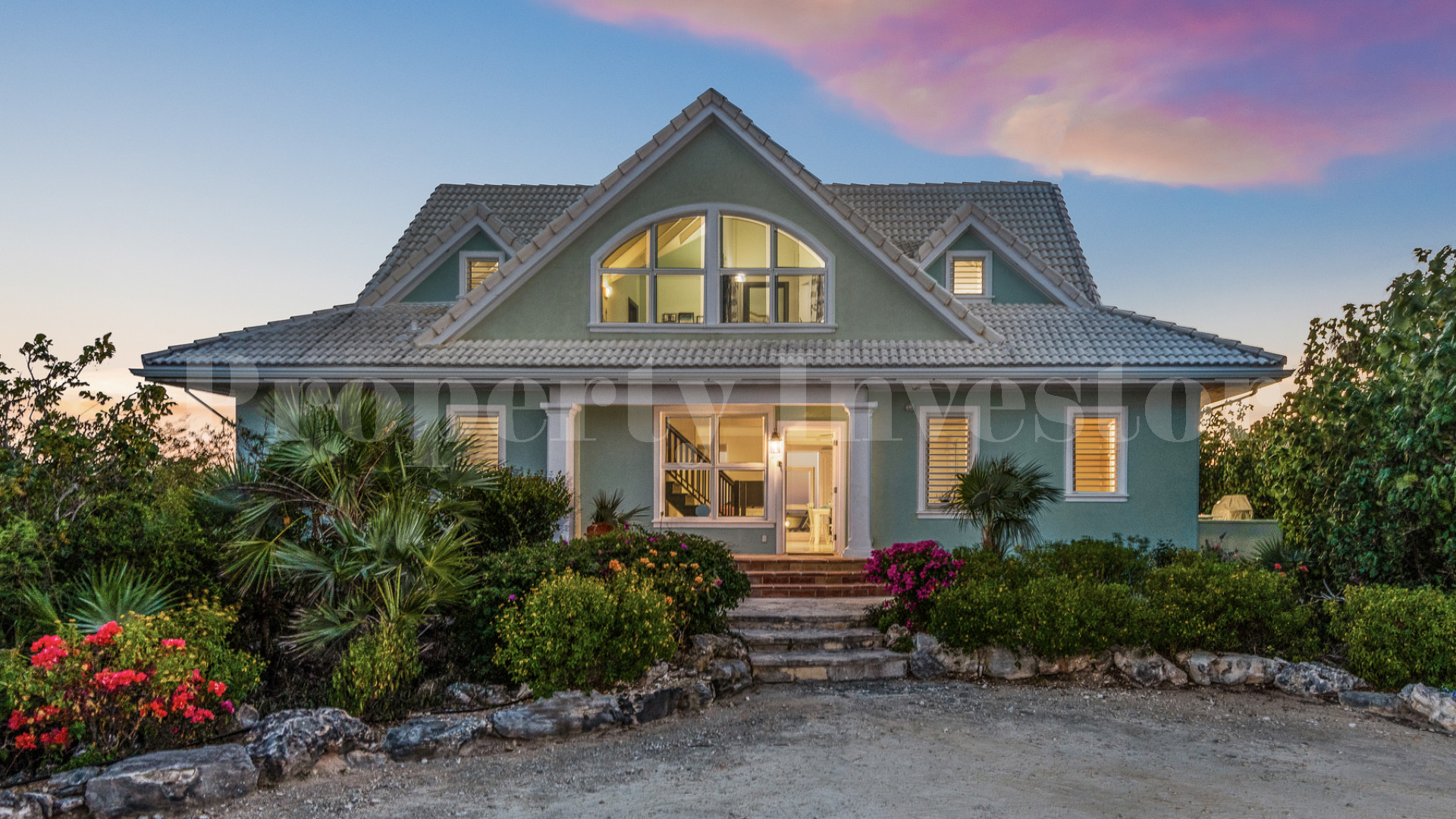 Fantastic 4 Bedroom Cape Cod Style Luxury Beach House for Sale  on Taylor Bay Beach, Turks & Caicos