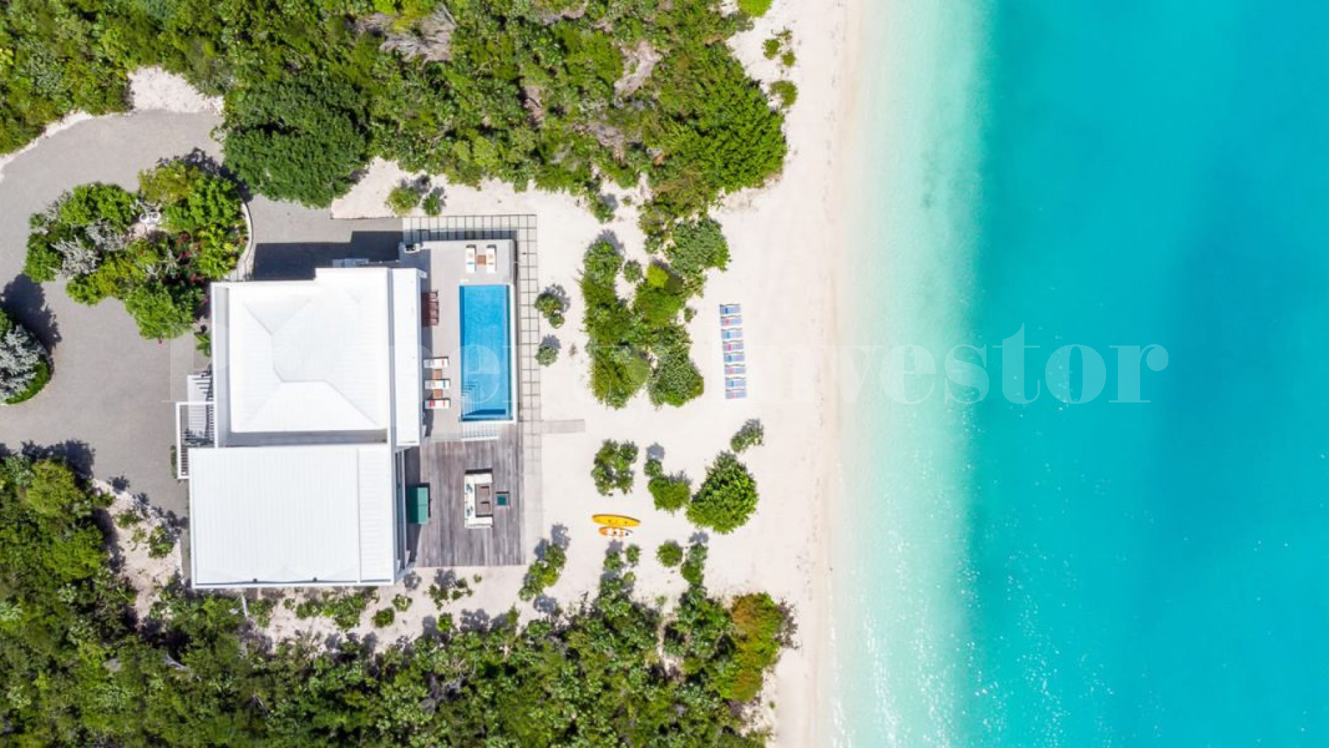 Прекрасный роскошный дом на пляже с 6 спальнями в Тёркс и Кайкос