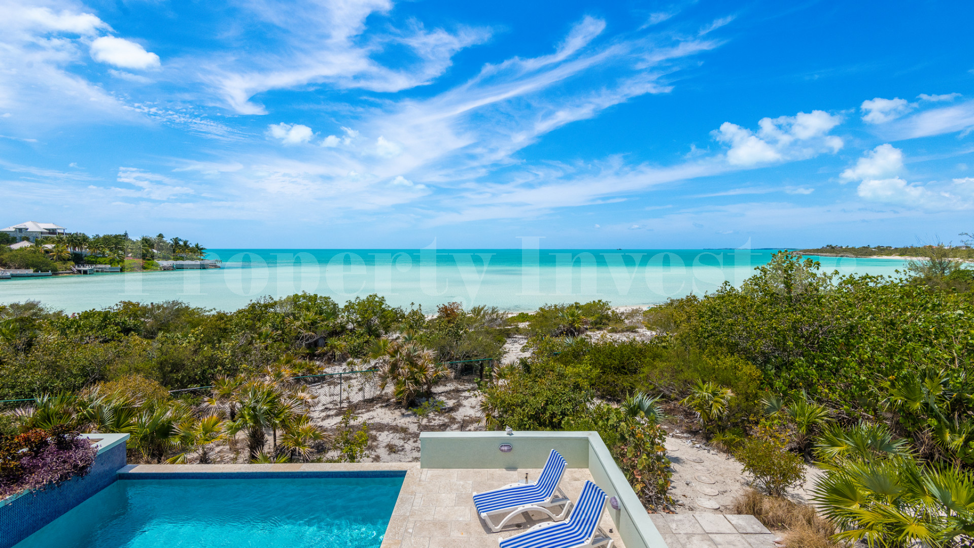 Fantastic 4 Bedroom Cape Cod Style Luxury Beach House for Sale  on Taylor Bay Beach, Turks & Caicos