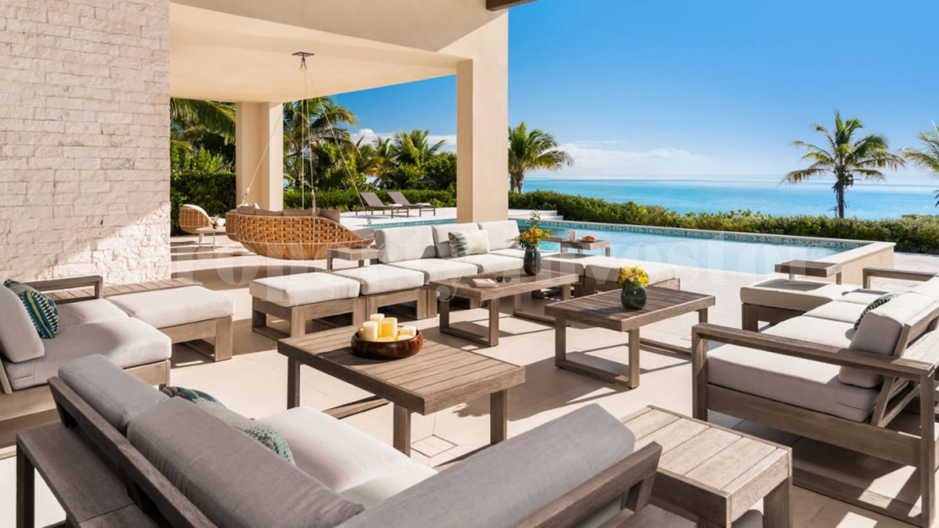 Изысканный роскошный дом на 7 спален на пляже в Тёркс и Кайкос