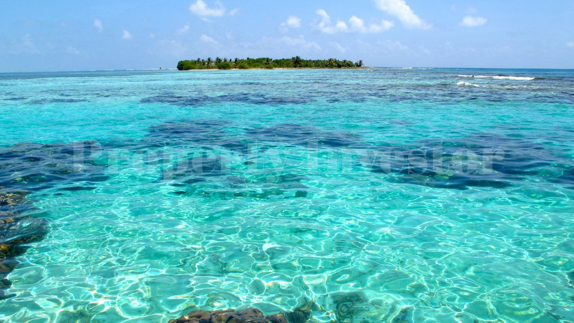 Private Island Resort & PADI 5-Star Gold Palm Dive Center for Sale on Glover's Reef Atoll, Belize