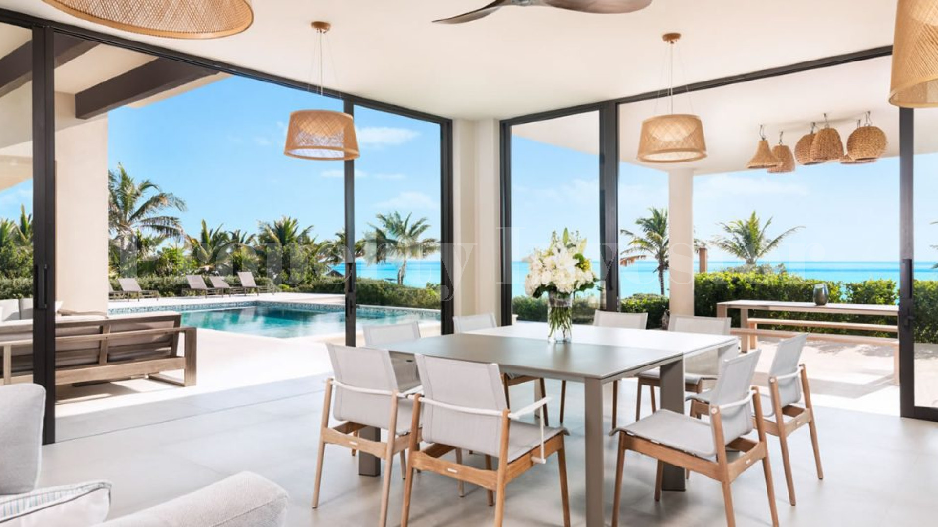 Изысканный роскошный дом на 7 спален на пляже в Тёркс и Кайкос