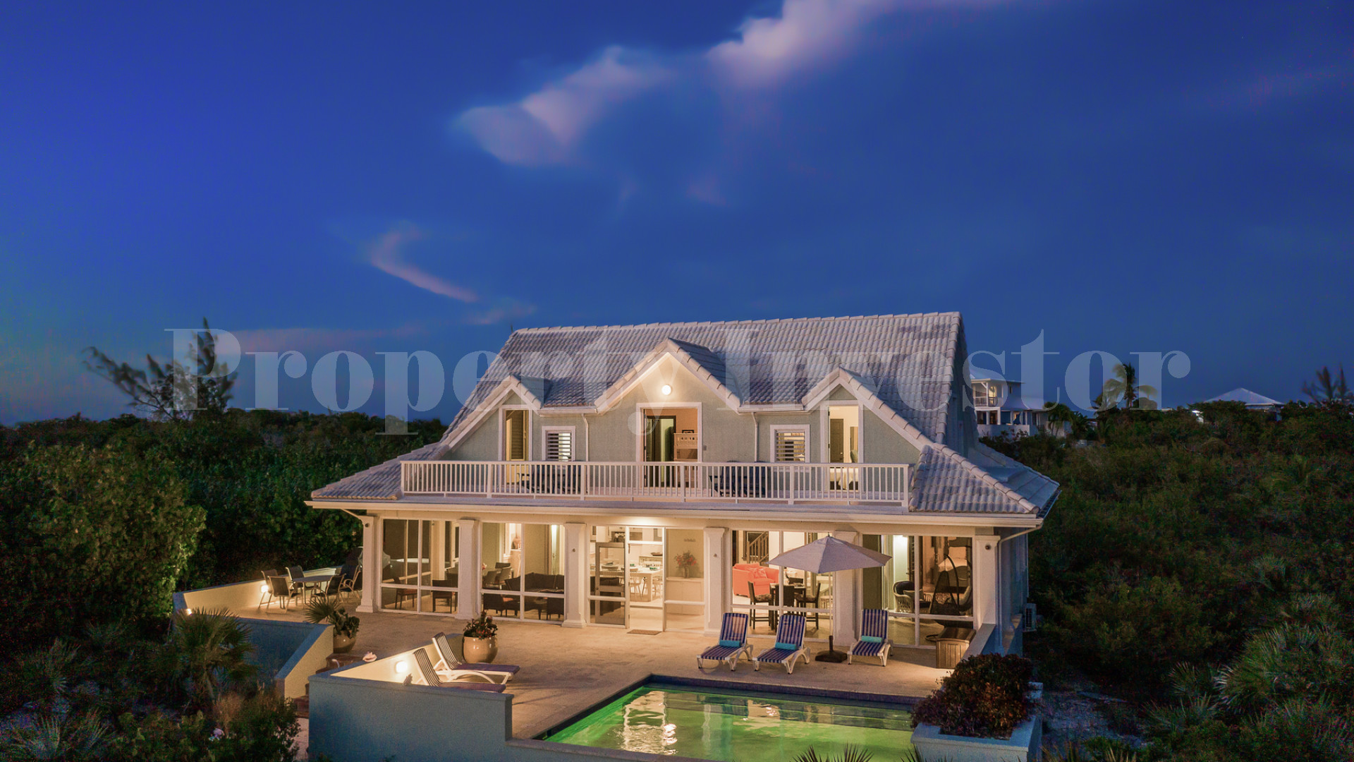Fantastic 4 Bedroom Cape Cod Style Luxury Beach House for Sale  on Taylor Bay Beach, Turks & Caicos