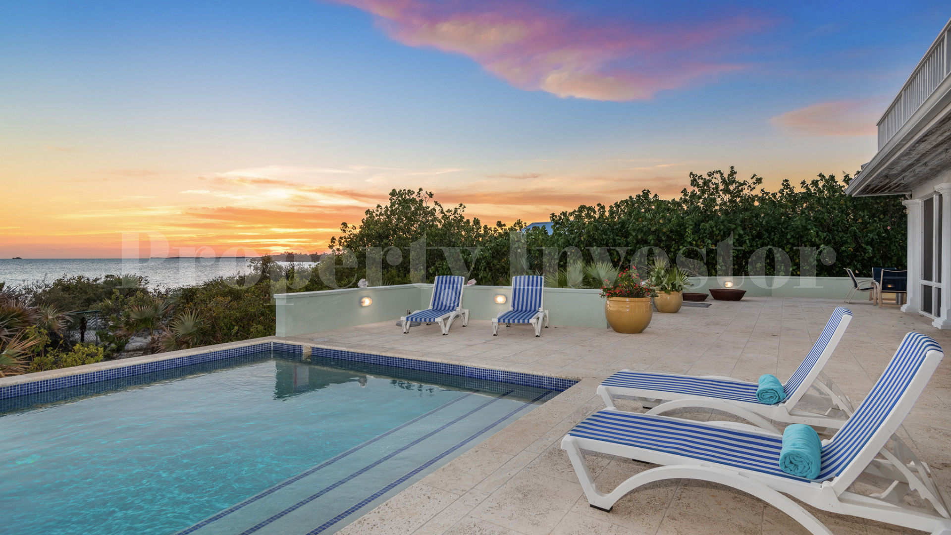 Fantastic 4 Bedroom Cape Cod Style Luxury Beach House for Sale  on Taylor Bay Beach, Turks & Caicos